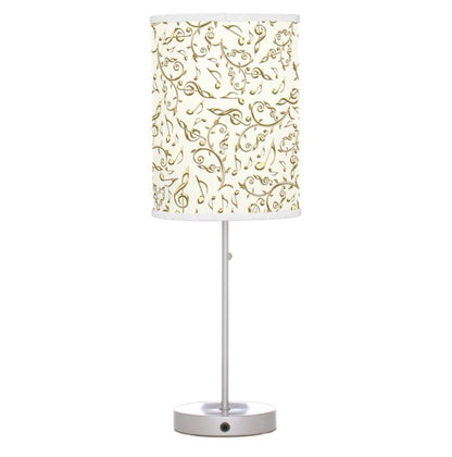 Decorative table lamp with a patterned shade on a white background