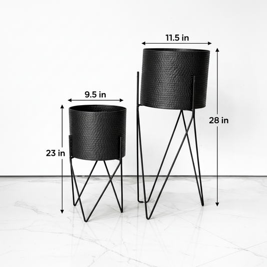 Two black metal planters with dimensions indicated on a white background