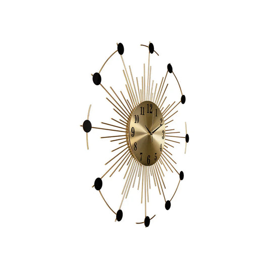 Decorative wall clock with sunburst design on a white background