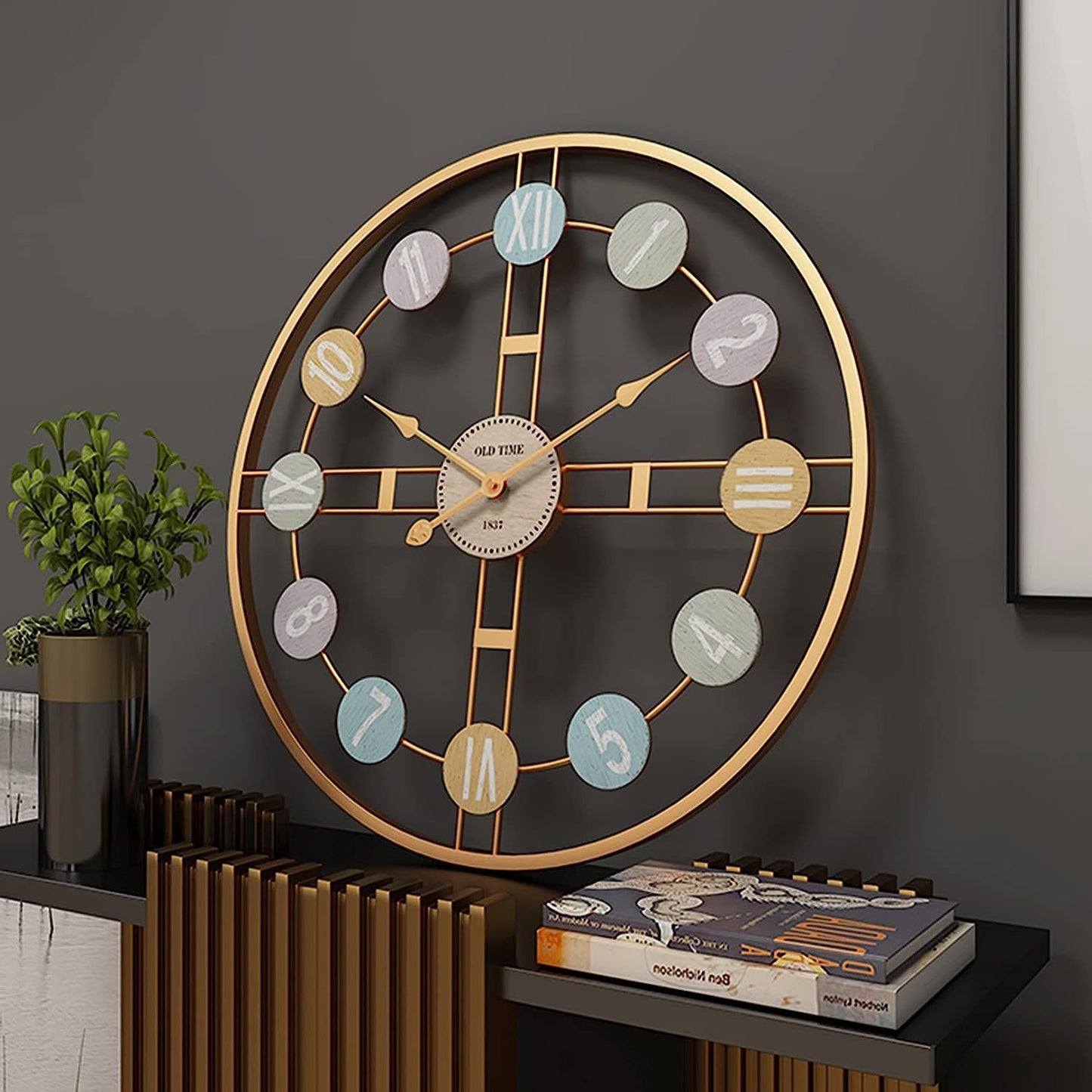 Decorative wall clock with colorful accents on a dark wall