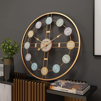 Decorative wall clock with colorful accents on a dark wall
