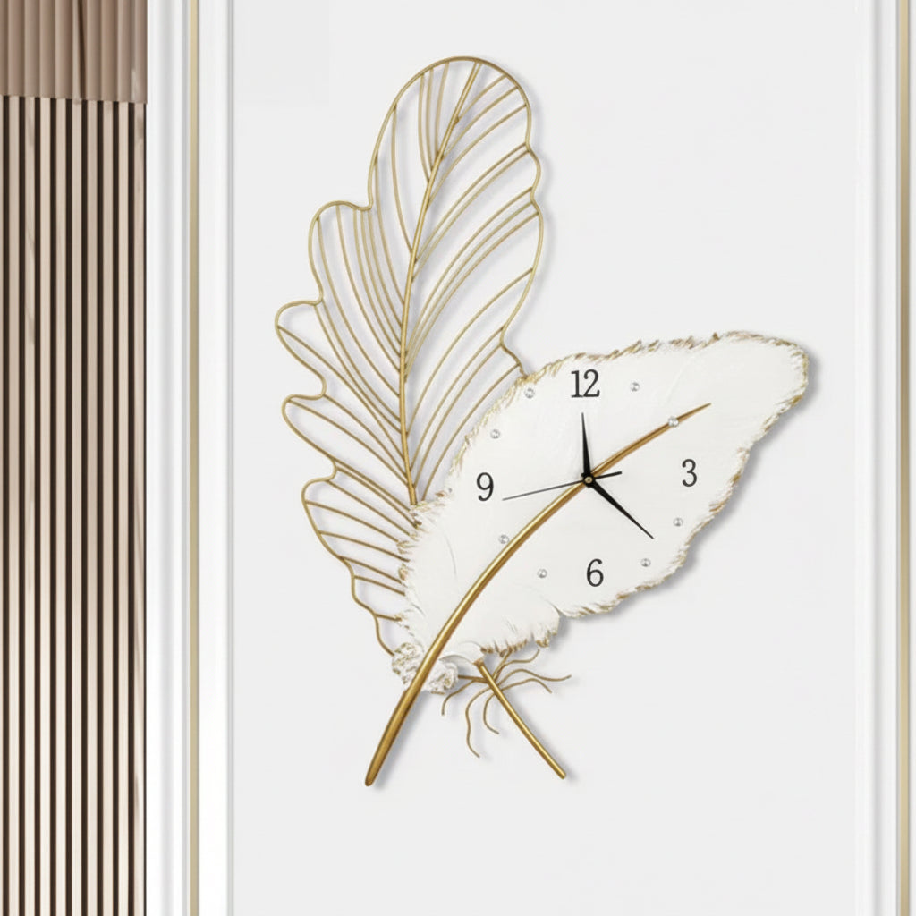 Decorative wall clock with leaf design on a white background