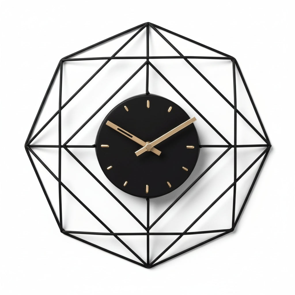 Geometric wall clock with black face and gold hands on a light gray background