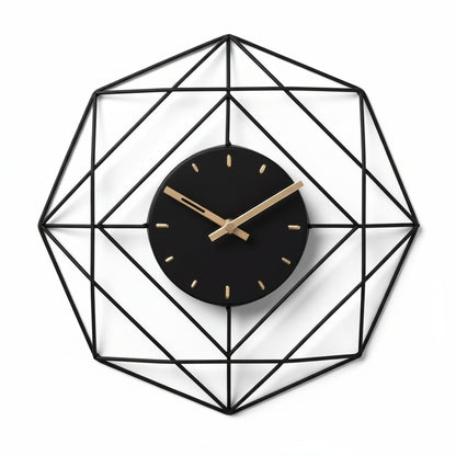 Geometric wall clock with black face and gold hands on a light gray background