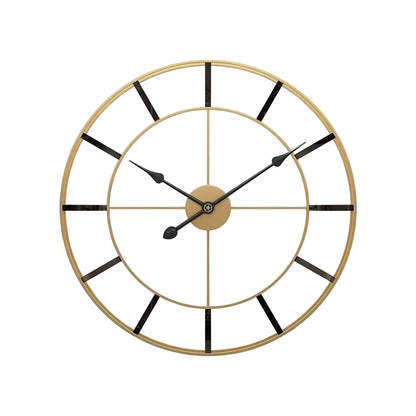 Gold wall clock with black Roman numerals on a white background