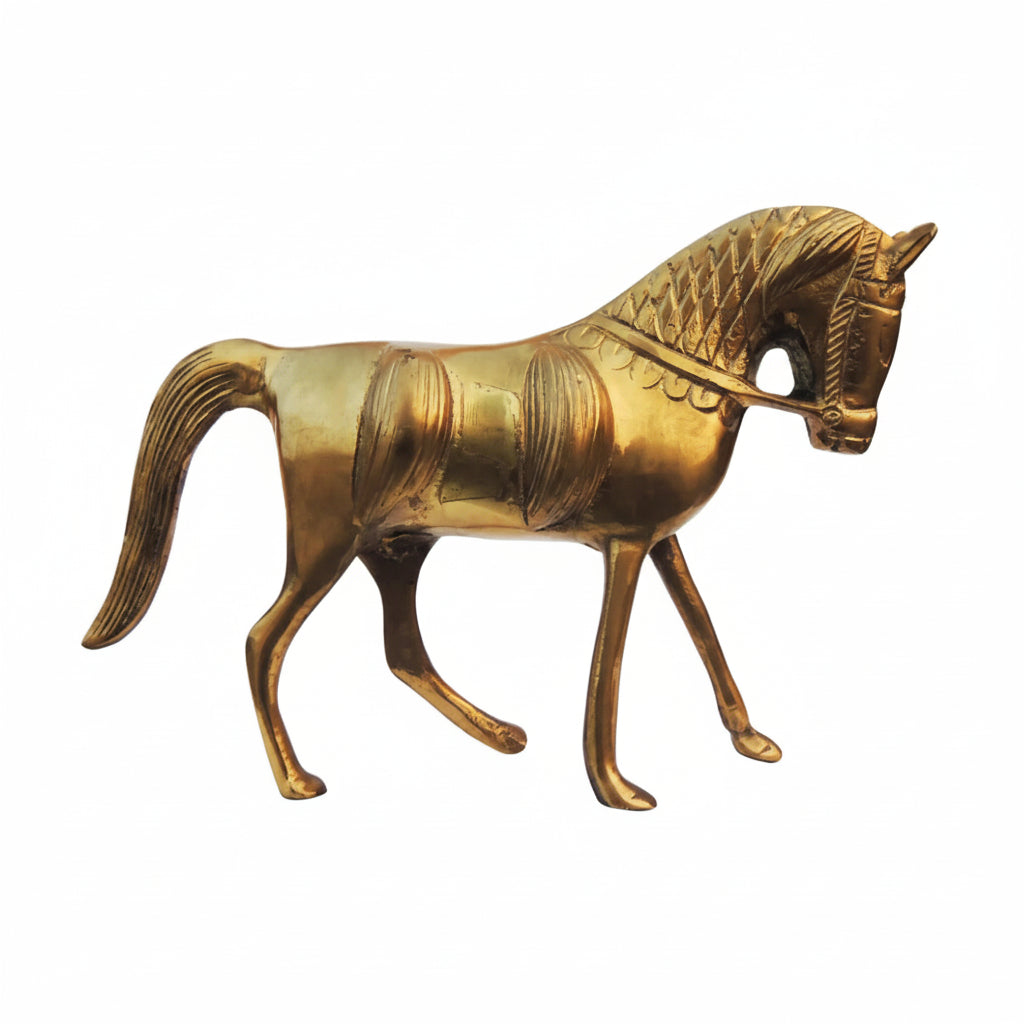 Brass horse figurine on a white background