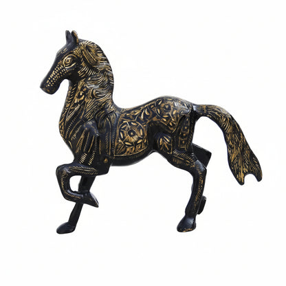 Decorative horse figurine with intricate gold patterns on a white background