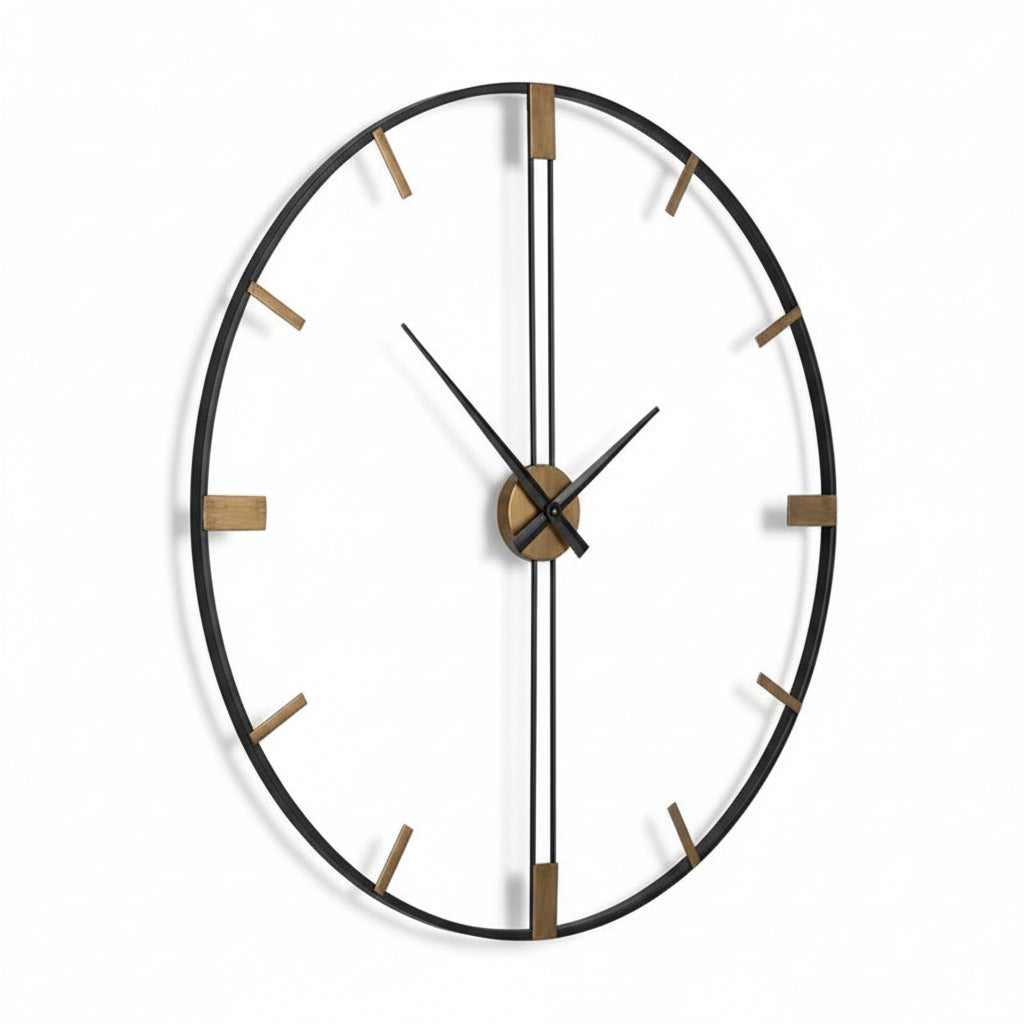 Large round wall clock with black frame and gold accents on a white background