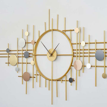 Decorative wall clock with gold and multicolor design on a light gray background