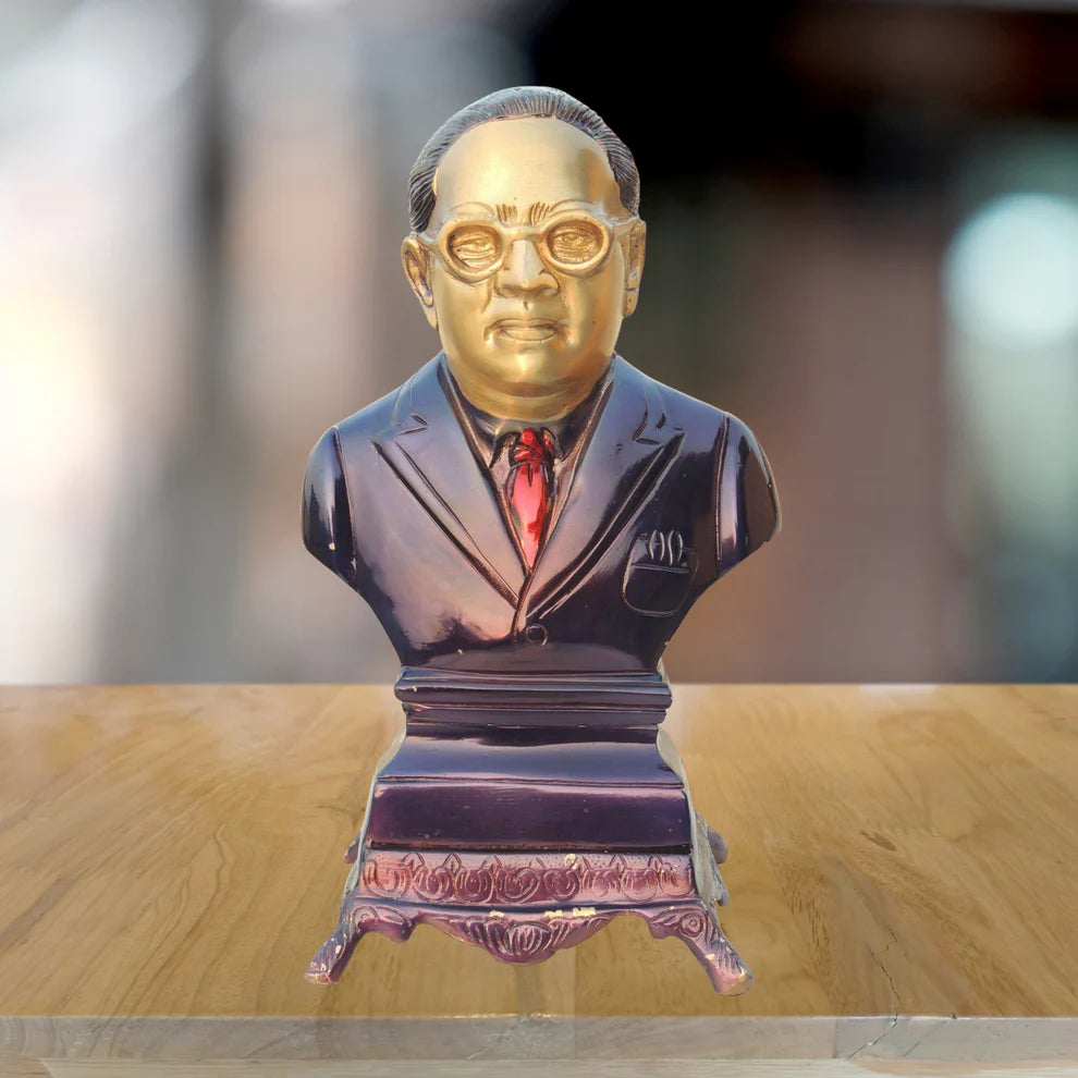 Bust of a man in a suit with a red tie on a wooden surface