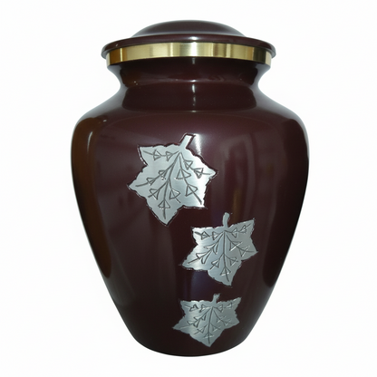 Brown urn with silver leaf designs on a white background
