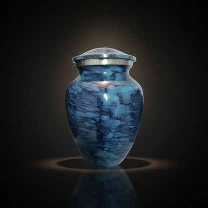 Blue urn with a metallic lid on a dark background