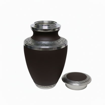 Black urn with silver decorative elements on a white background