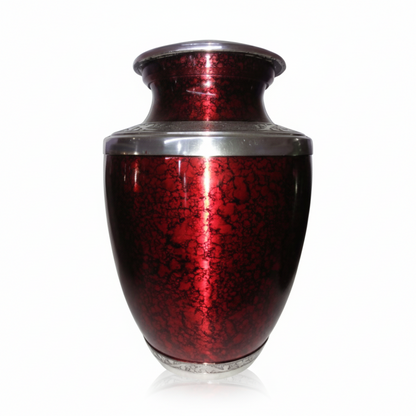 Red metallic urn on a white background
