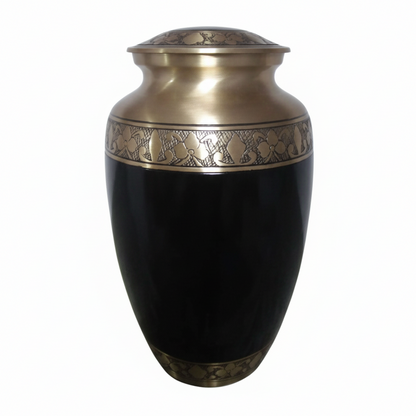 Black urn with a gold lid on a white background