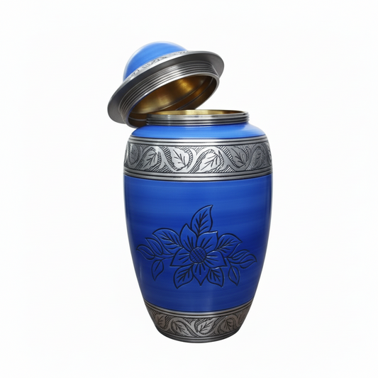 Blue urn with silver floral design on a white background