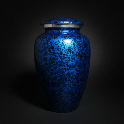 Blue ceramic urn with a dark background