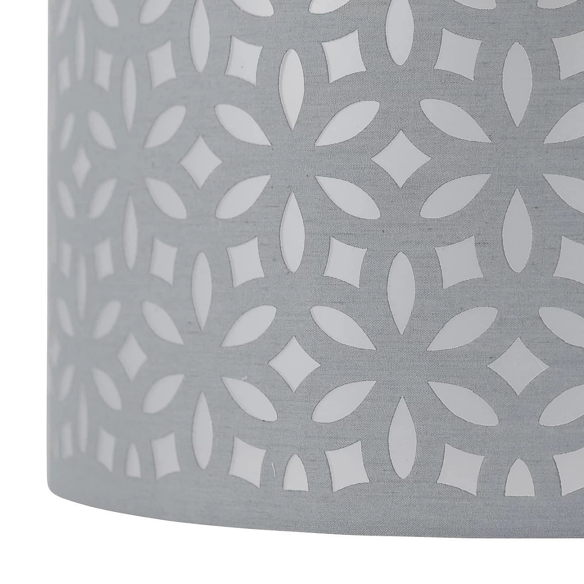 Gray fabric lampshade with a geometric white pattern