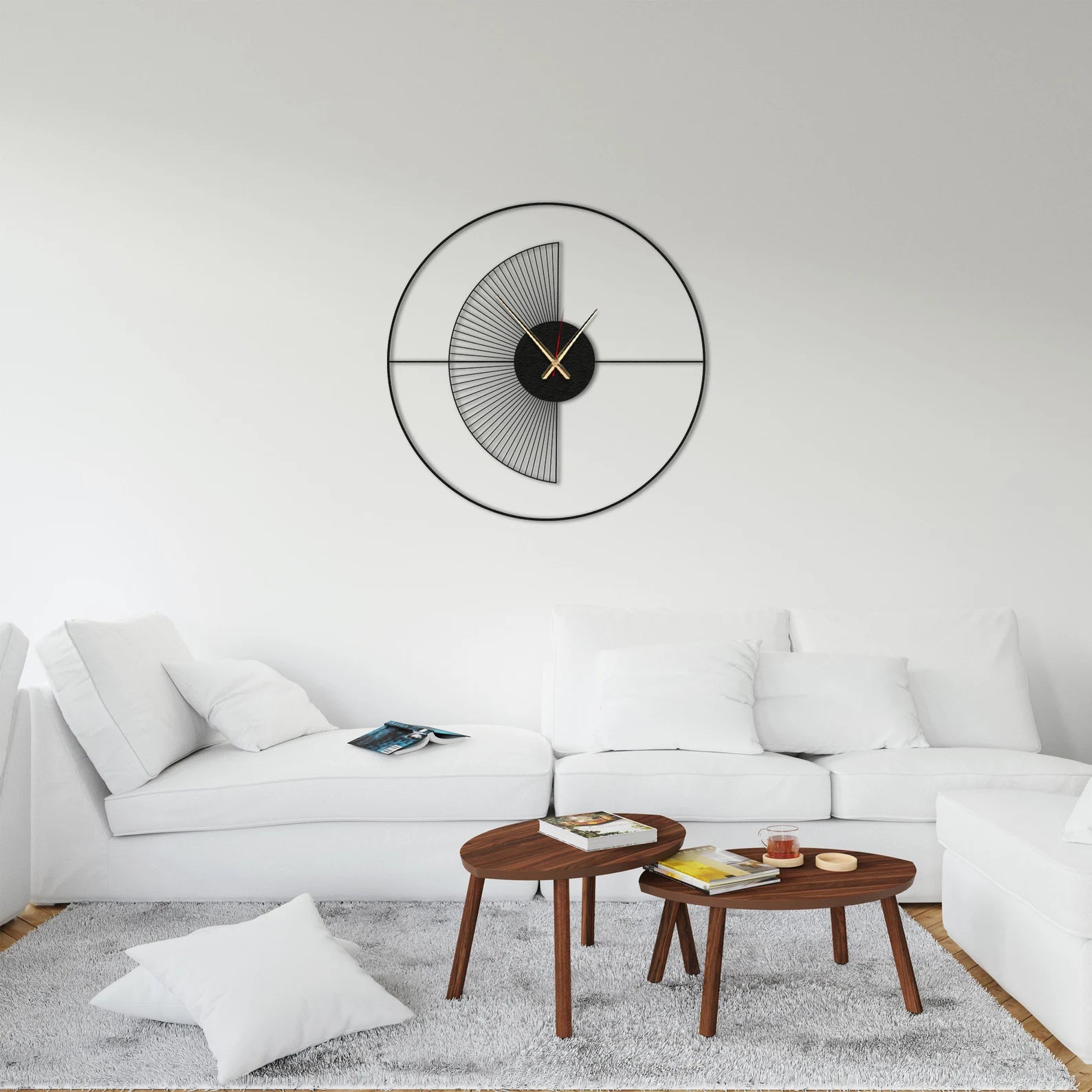 Modern living room with a white sofa, wooden coffee table, and decorative wall clock.