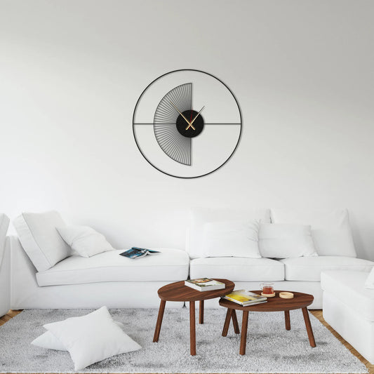 Modern living room with a white sofa, wooden coffee table, and decorative wall clock.