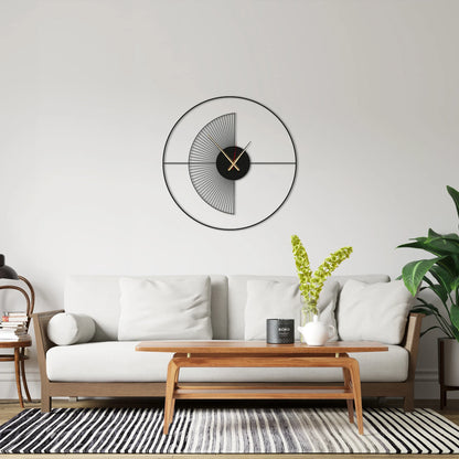 Modern living room with a white sofa, wooden coffee table, and decorative wall clock.
