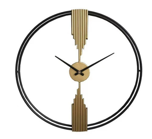 Decorative wall clock with gold and black design on a white background